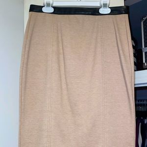 Gently used pencil skirt with gold exposed zipper and faux leather waist detail